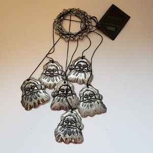 Erco Pewter Santa Heads and Wreath Wind Chime New